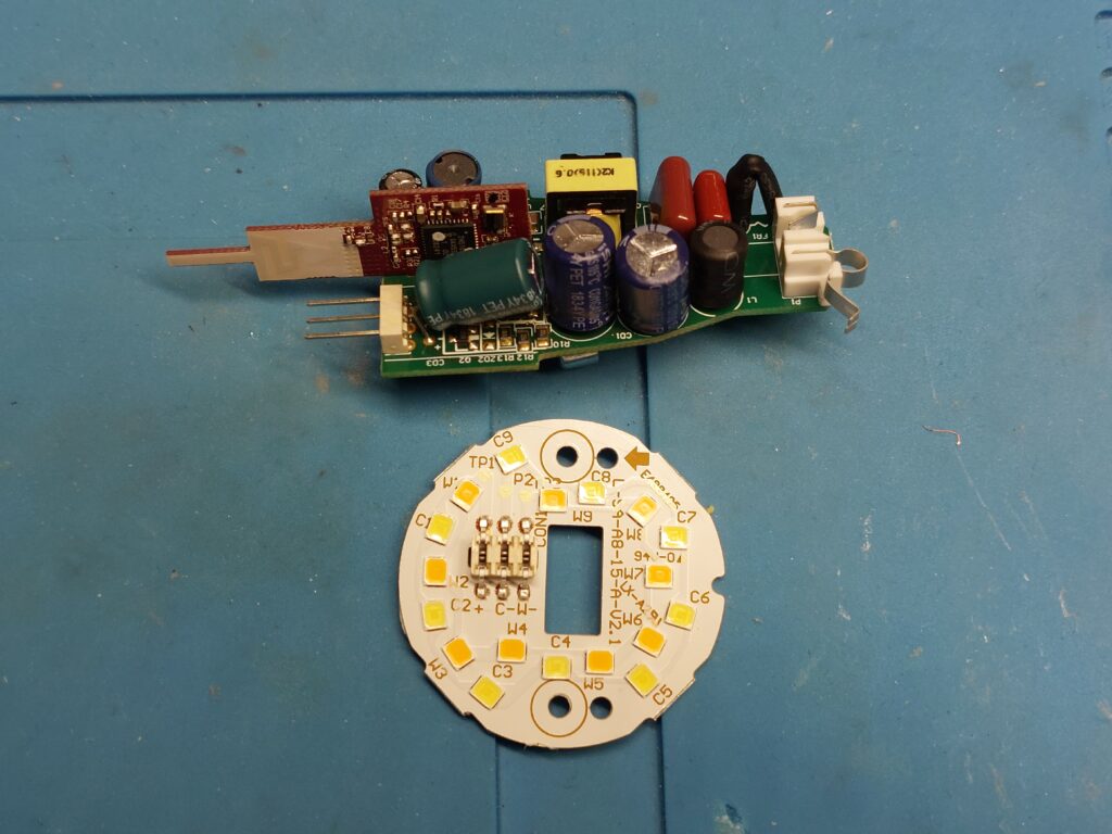 PCB and mainboard removed, sliding contacts on the mainboard visible